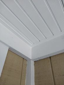 A close up of a white ceiling on a house