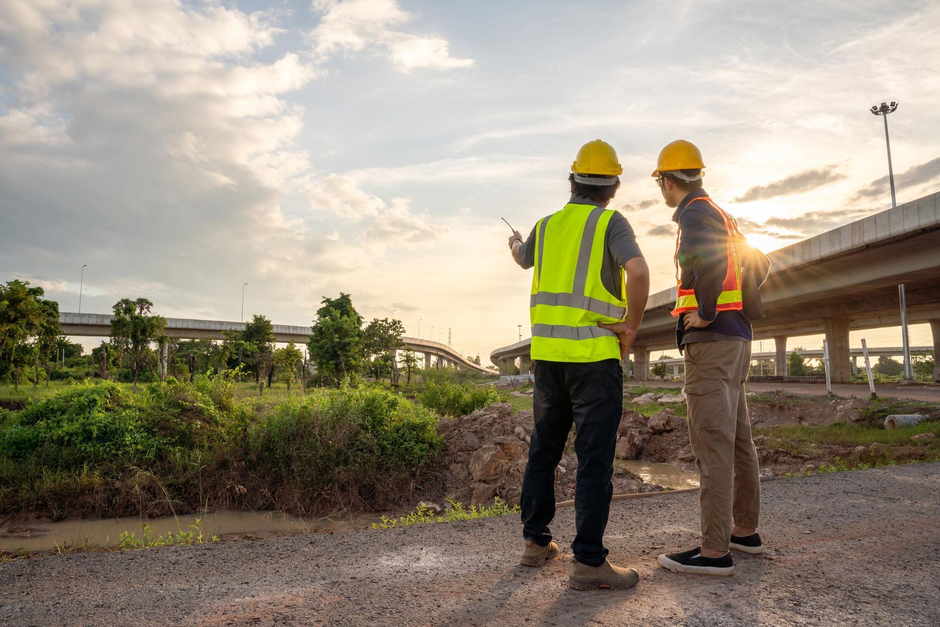 Worker installing asphalt shingles on a roof during residential roofing construction. Worker installing asphalt shingles on a roof during residential roofing construction.