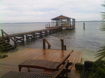 Sun-kissed Dock — Bench and Boat House in Gulf Breeze, FL