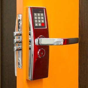 Door handle integrated security system