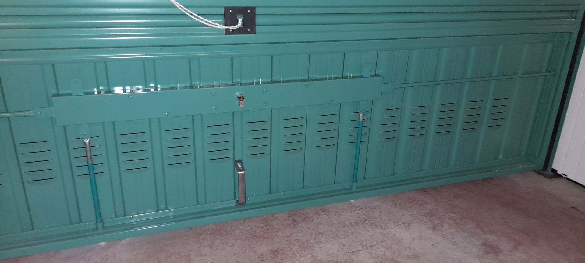 porta basculante in metallo Automazioni Pippia Genova