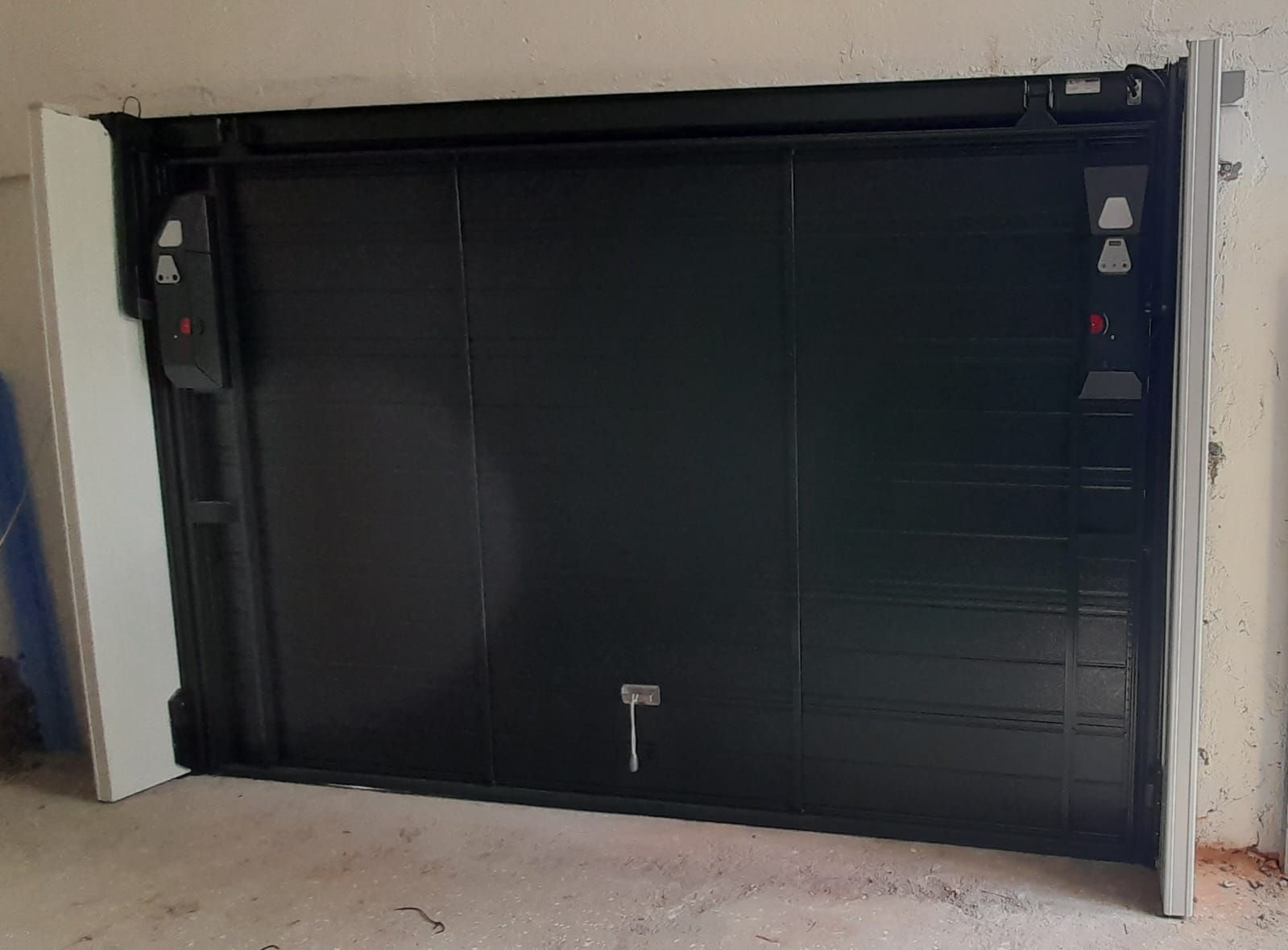 porta garage verde Automazioni Pippia Genova