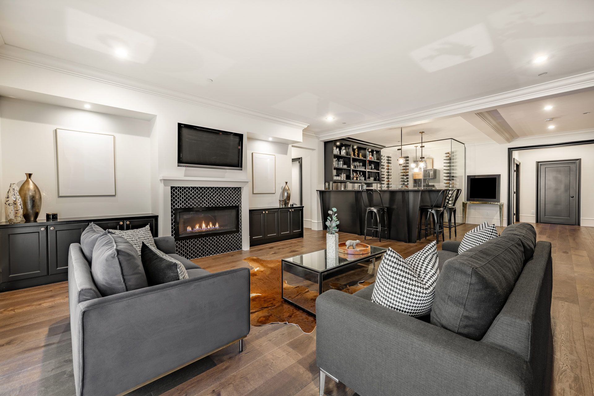A living room filled with furniture and a fireplace.