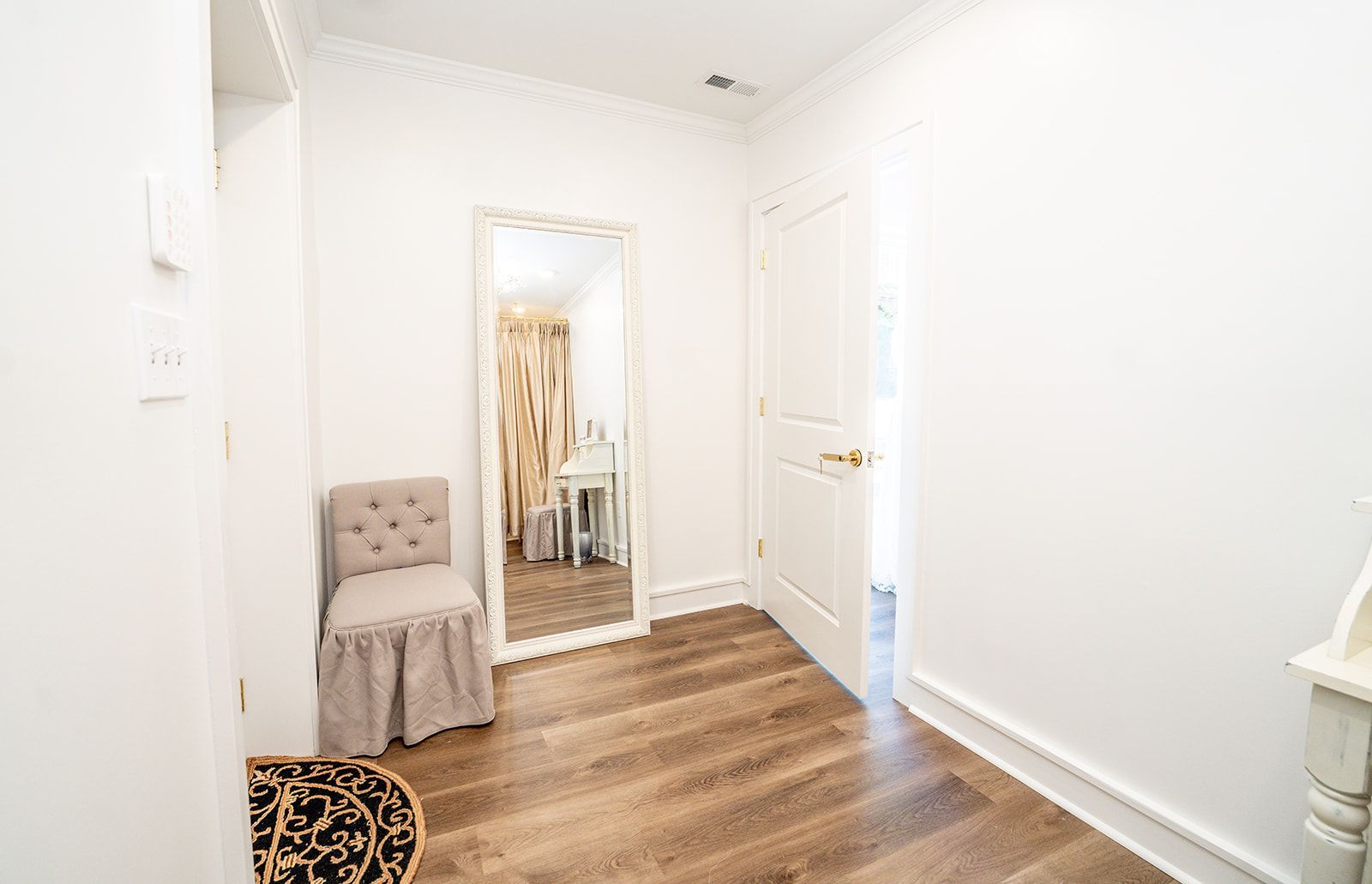 There is a large mirror in the middle of the room.