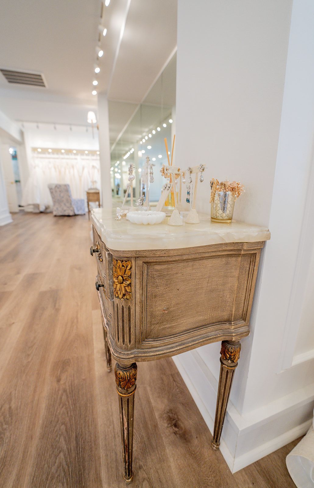 A small table with a sink on top of it in a room.