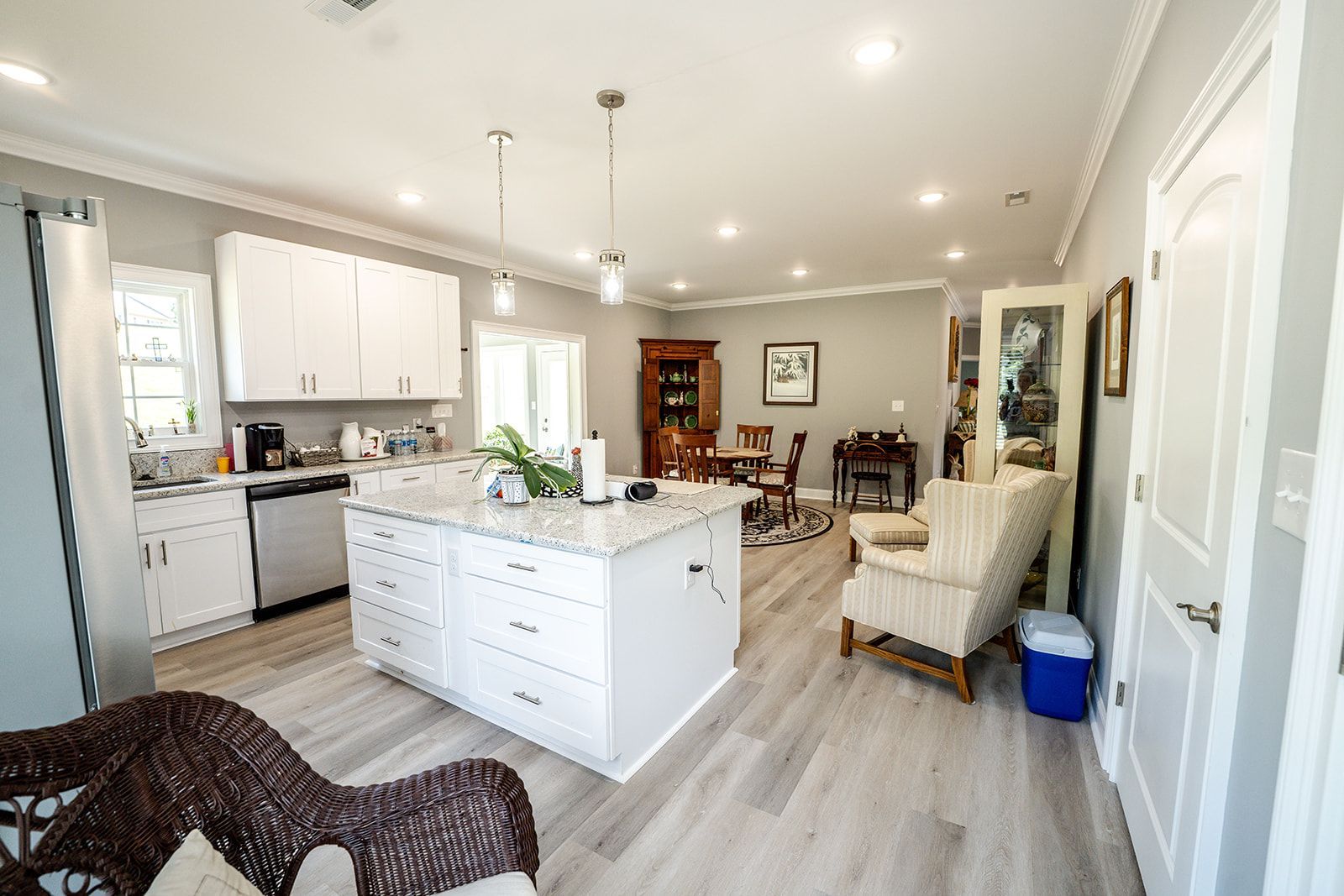 There is a large island in the middle of the kitchen.
