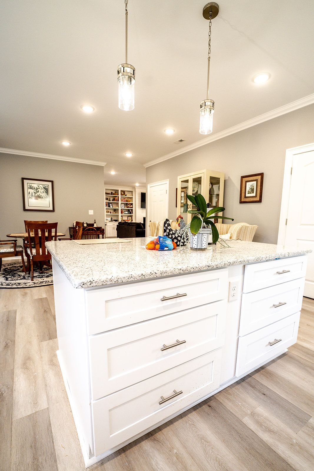 There is a large island in the middle of the kitchen.