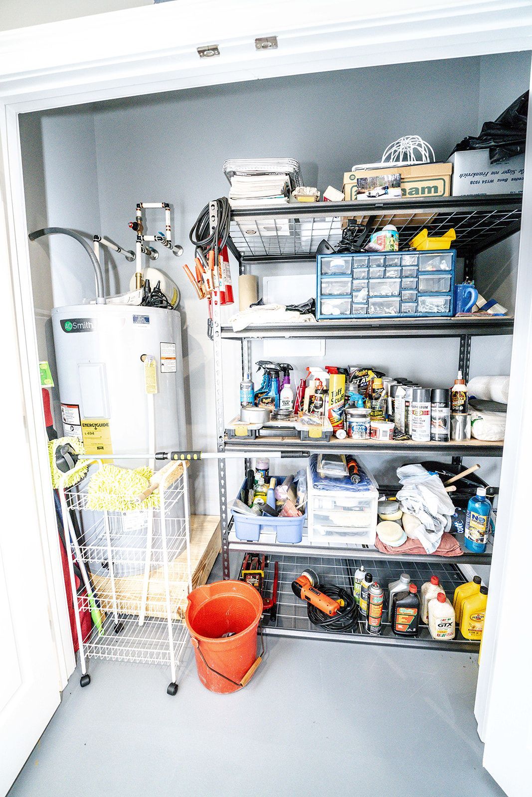 A closet filled with lots of tools and supplies.