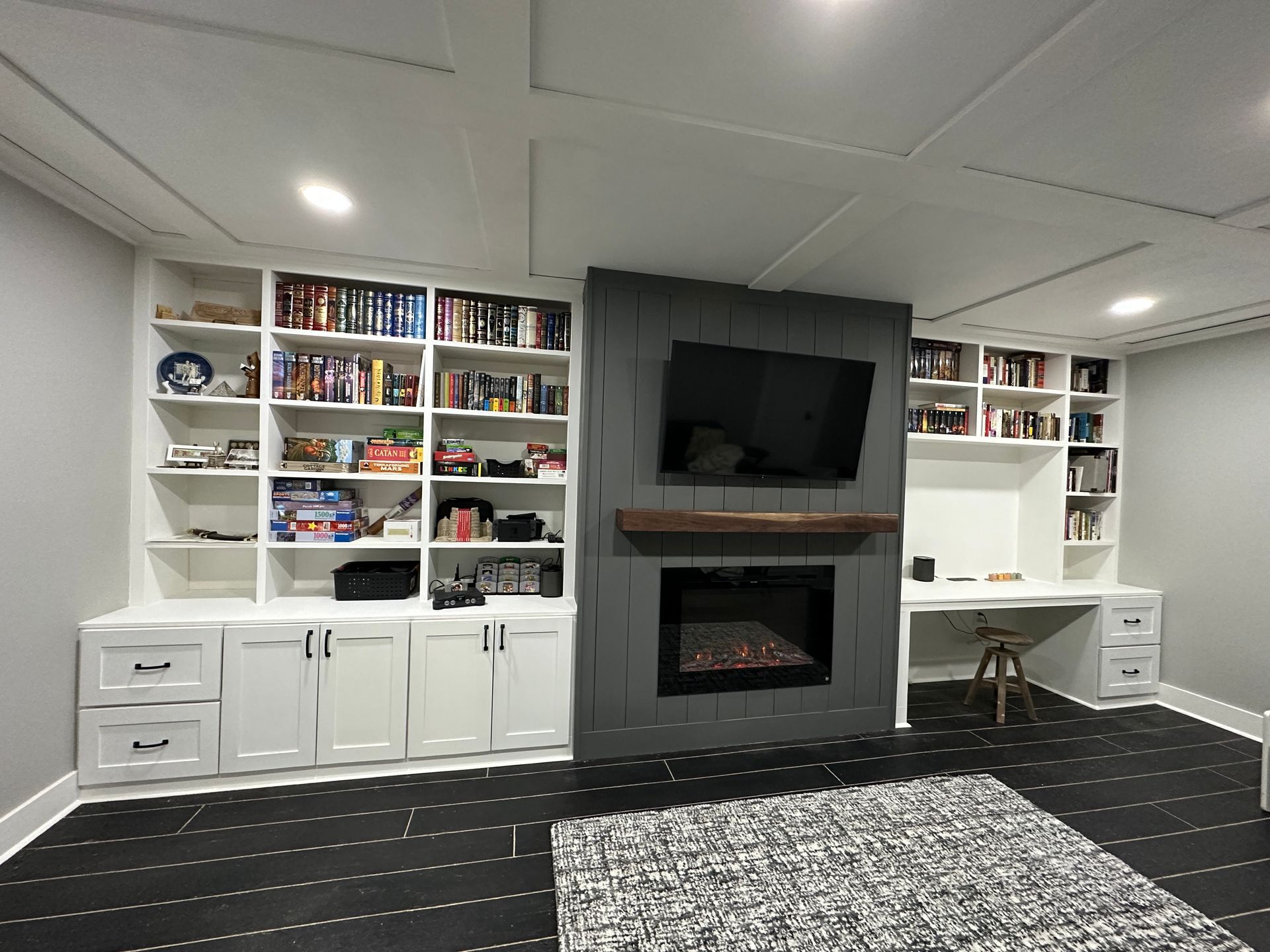 There is a fireplace in the middle of the room.