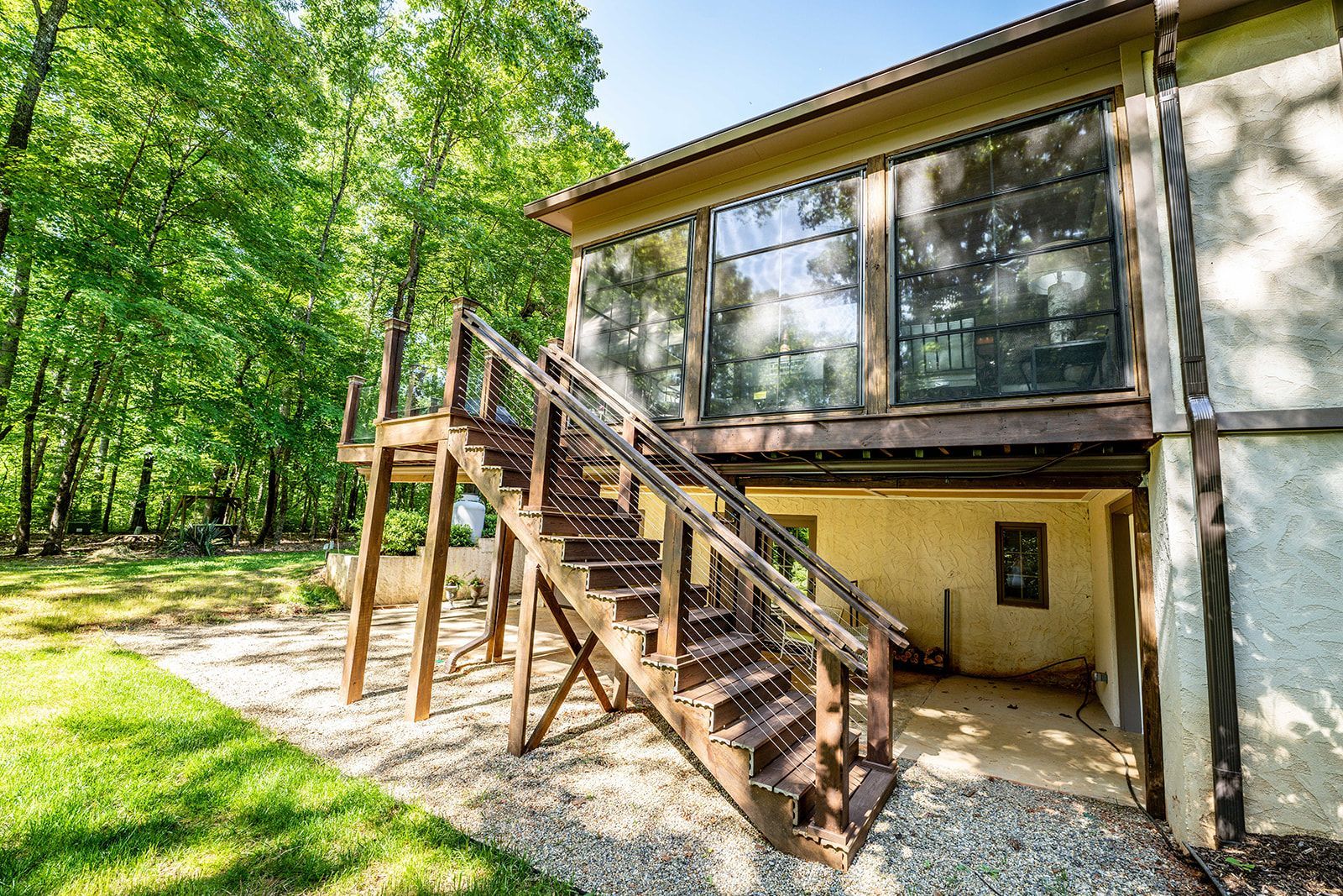 A house with stairs leading up to the second floor.