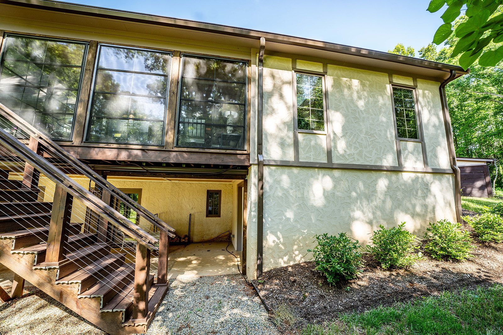 A house with stairs leading up to the second floor