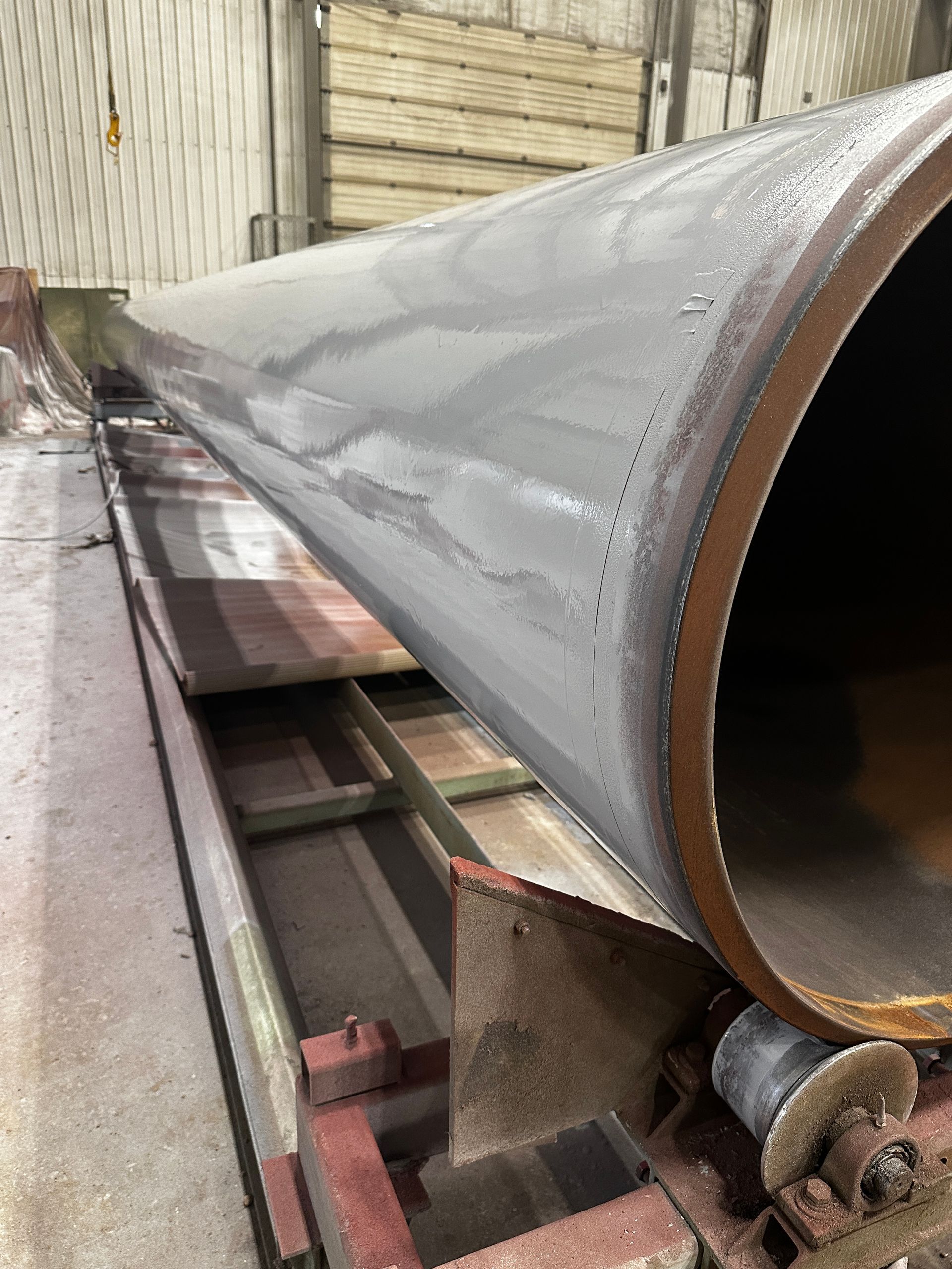 Pipeline post-blast cleaning in preparation for industrial coating application