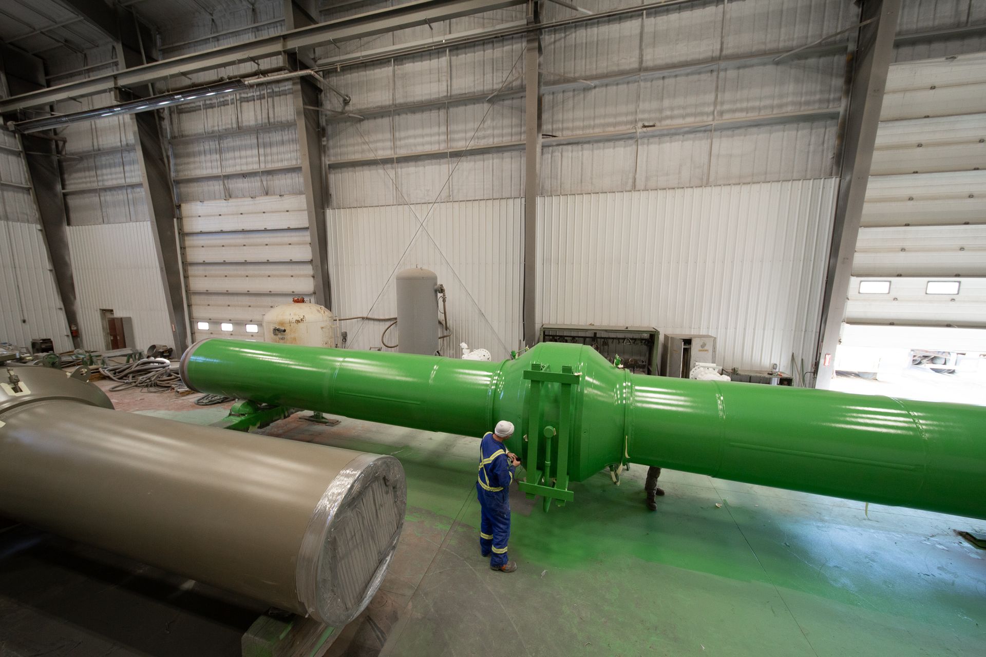 Industrial pipe after blast cleaning and coating application inside Norpoint's facility