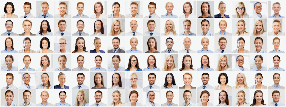 Grid of diverse business headshots, mostly light-skinned, smiling slightly against a white background.