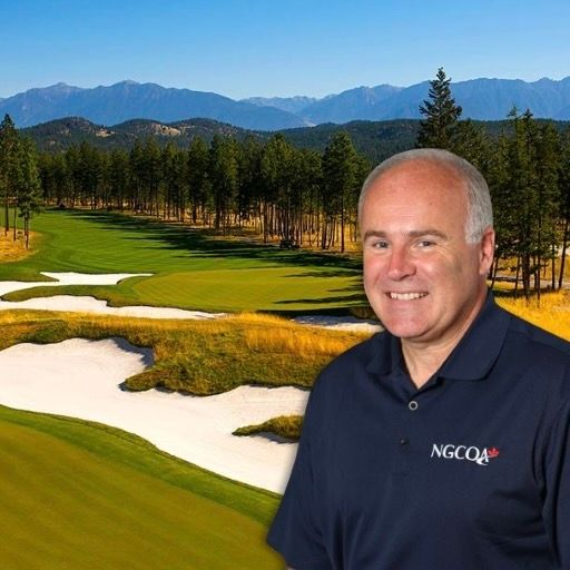 A man wearing a shirt that says ngcqa stands in front of a golf course
