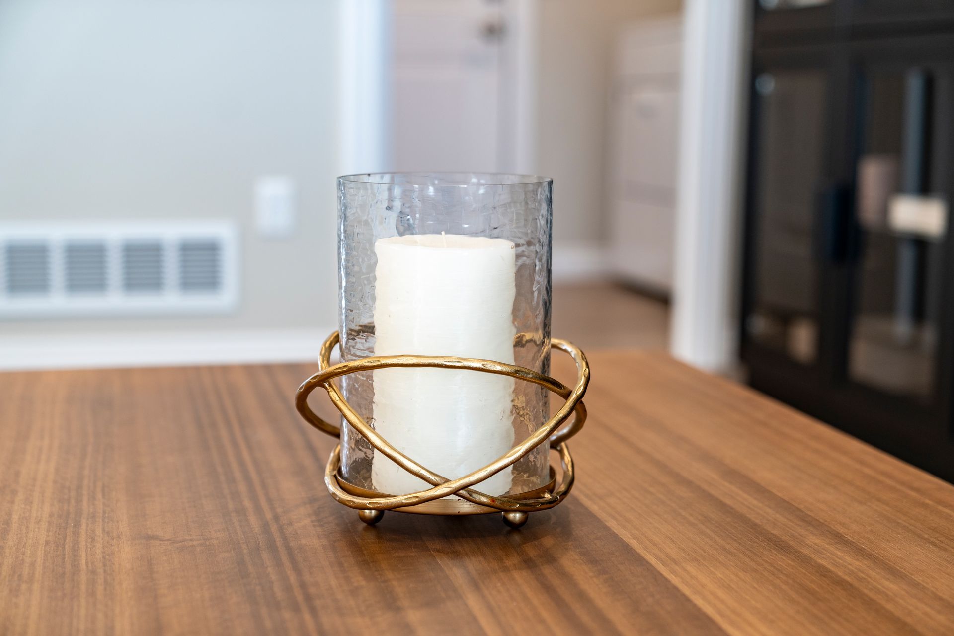 Closeup photo of a candle on a table