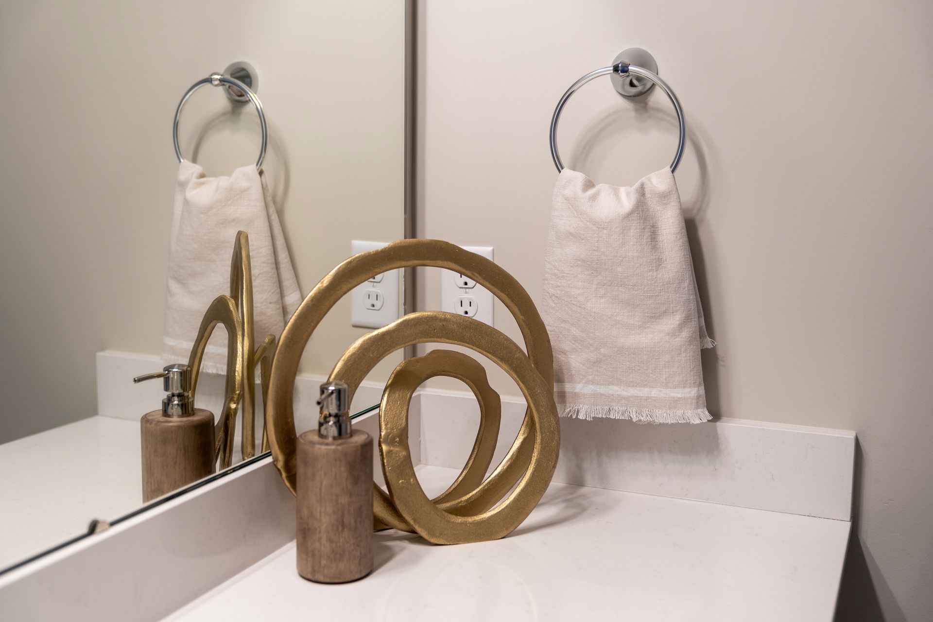 Photo of an arrangement on a bathroom sink