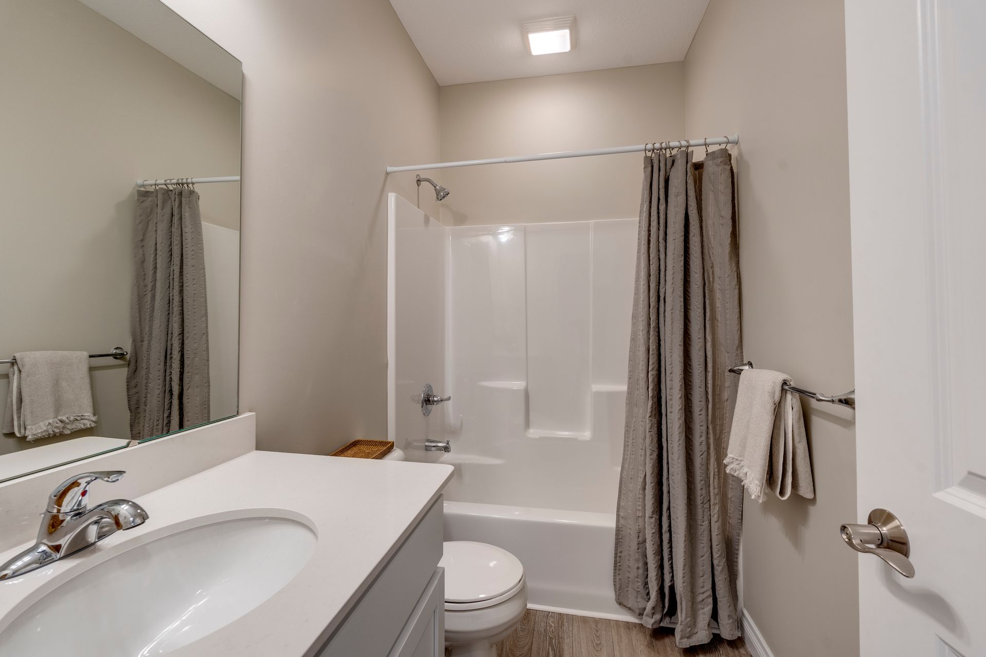Photo of a bathroom with a tub/shower combo
