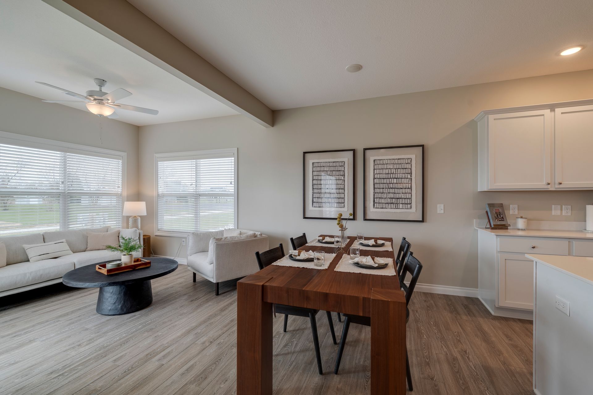 Photo of the dining area with a lounge area in the background