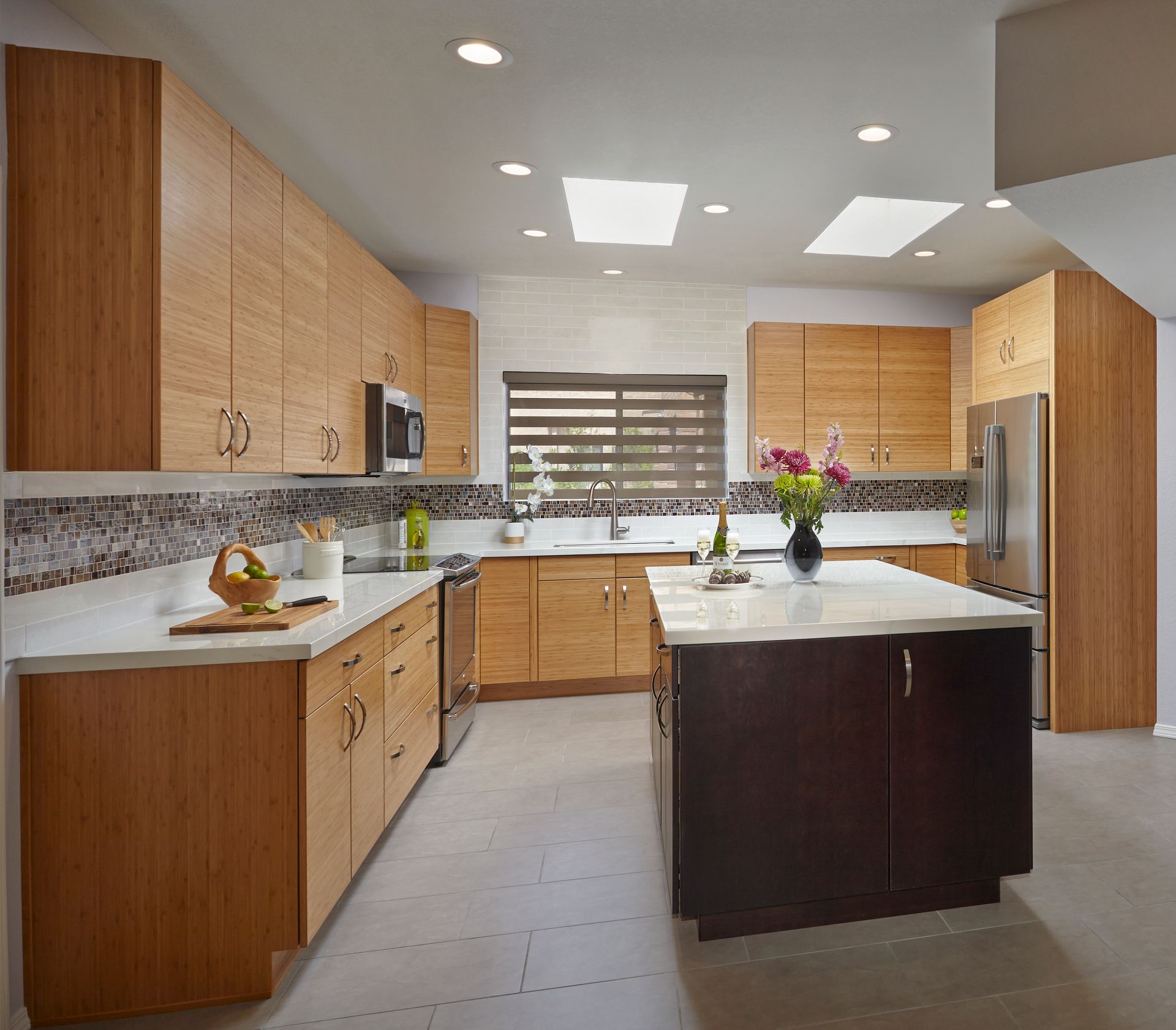A kitchen with wooden cabinets and stainless steel appliances