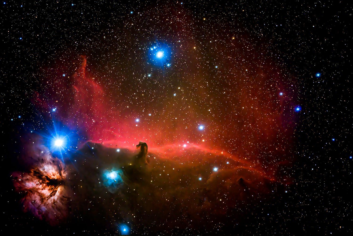 Brilliant capture of the Horsehead Nebula and surrounding stars in the night sky over Arkaroola, highlighting the vibrant red and orange hues in this deep-space image taken within an International Dark Sky Sanctuary.