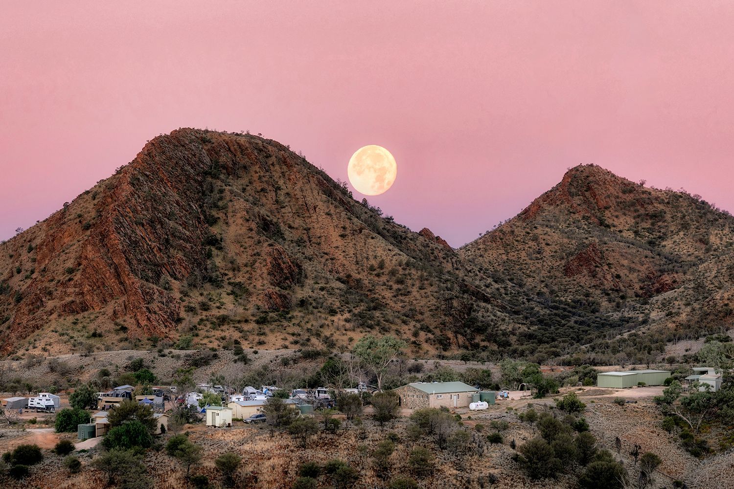 a night sky filled with lots of stars over a mountain range at Arkaroola International Dark Sky Sanctuary in the Flinders Ranges.