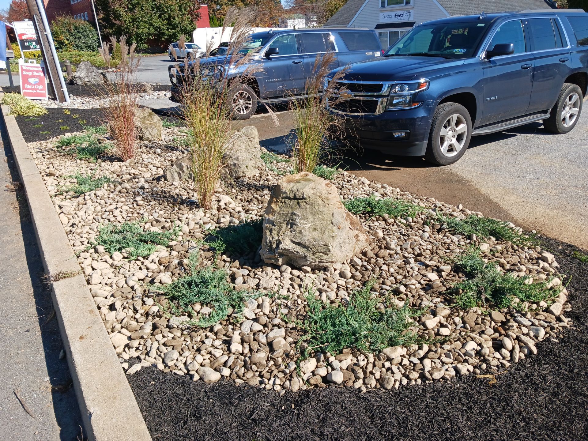 Two Car In Front Of The Landscape — Lancaster, PA — Paradise Plants & Patios