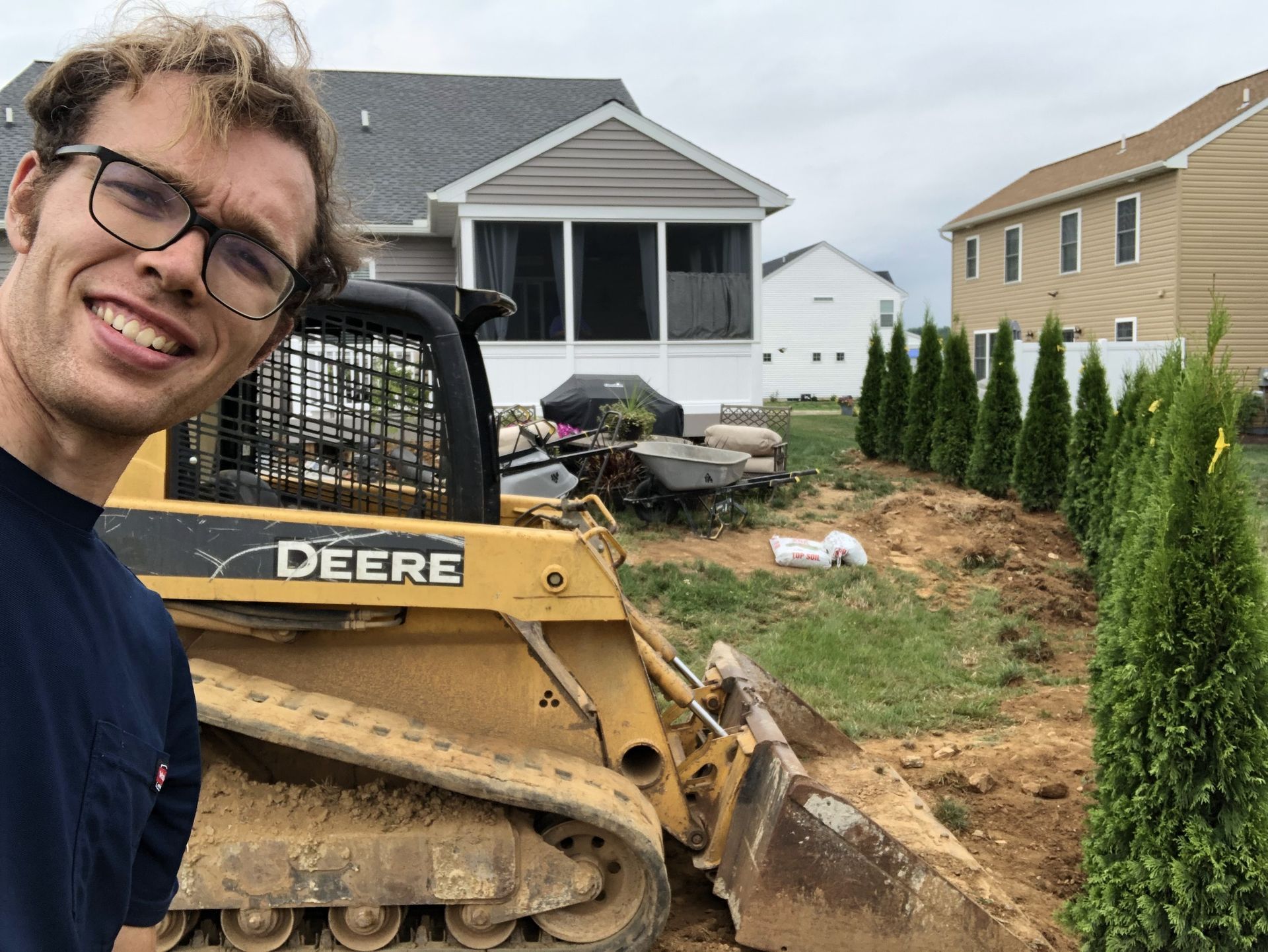 Man Near The Mini Excavator — Lancaster, PA — Paradise Plants & Patios
