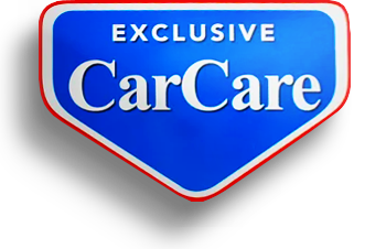 A blue sign that says exclusive carcare on it