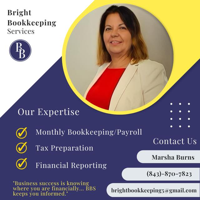 Person writing at a desk with a calculator, keyboard, glasses, and financial reports.