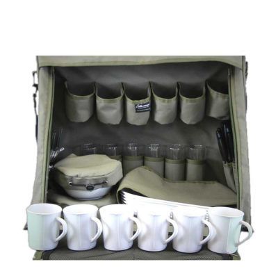 A bag filled with cups and glasses on a table.