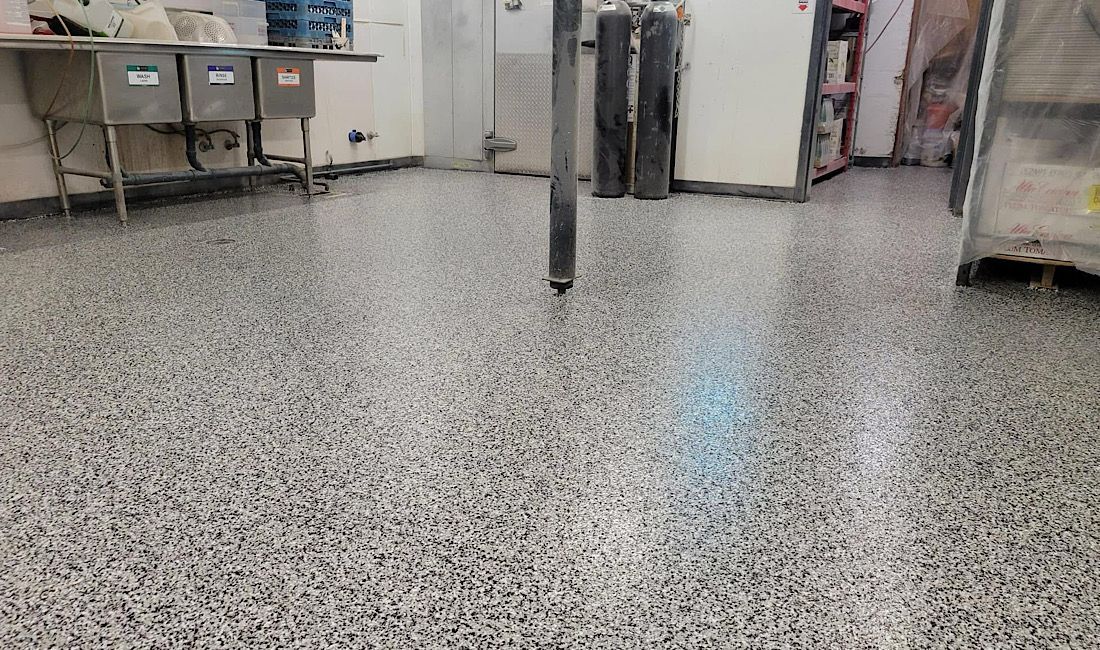 Concrete coating on garage floor with cold weather install.