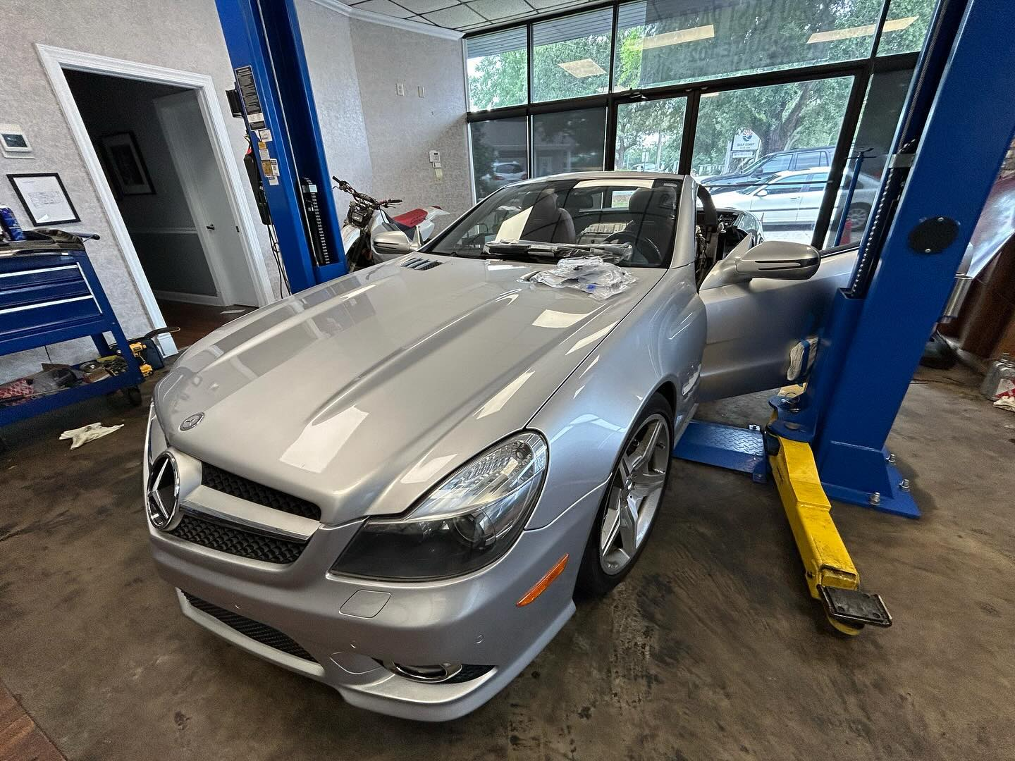 Silver Mercedes-Benz convertible in a garage bay | Randall's Autohaus