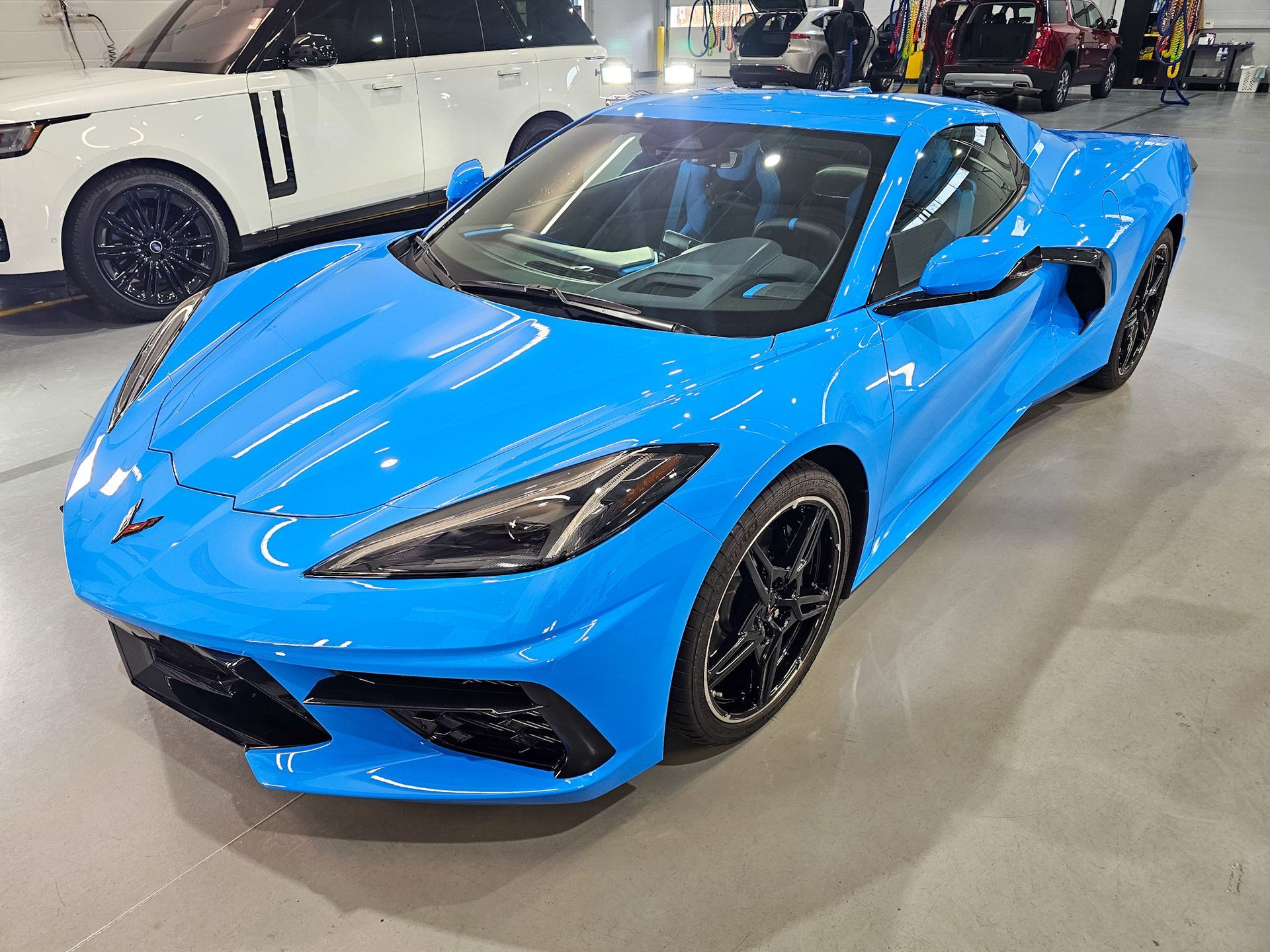 A vehicle with ceramic coating protection from contaminants like dirt, bird droppings, and road grime, ensuring a long-lasting, pristine finish.