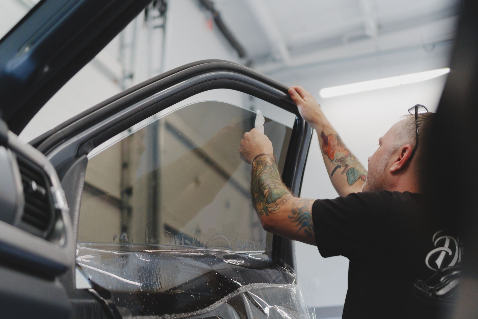 Learn how to clean tinted car windows without damaging the film. These expert cleaning tips help preserve your tint’s integrity.