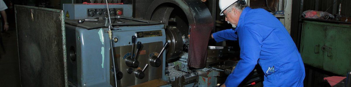 Technician Working on Industrial Machine, Odessa TX & Artesia NM