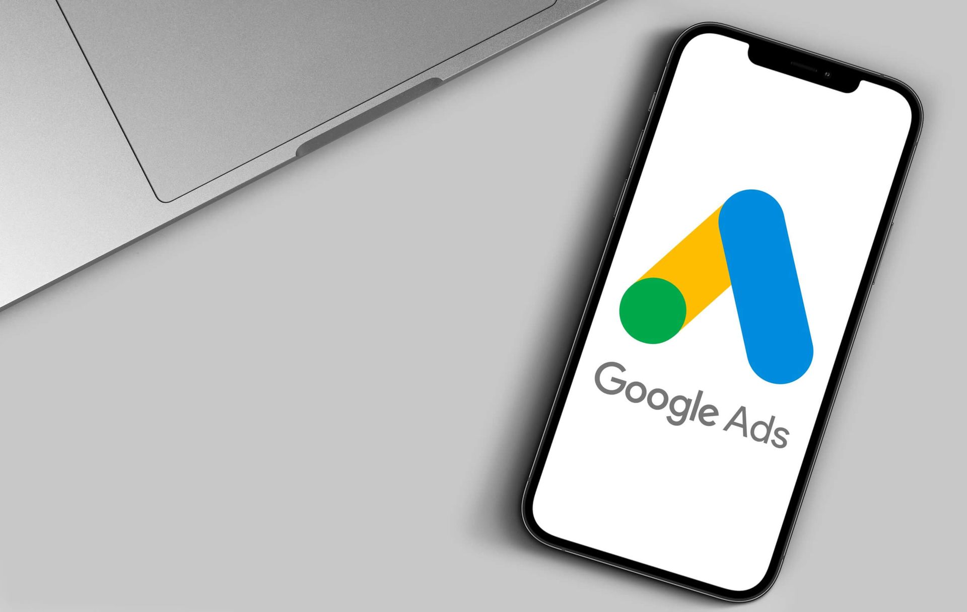 A mobile device with the Google Ads logo displayed onit