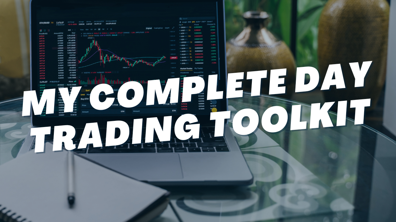 a laptop on a table with the words my complete day trading toolkit