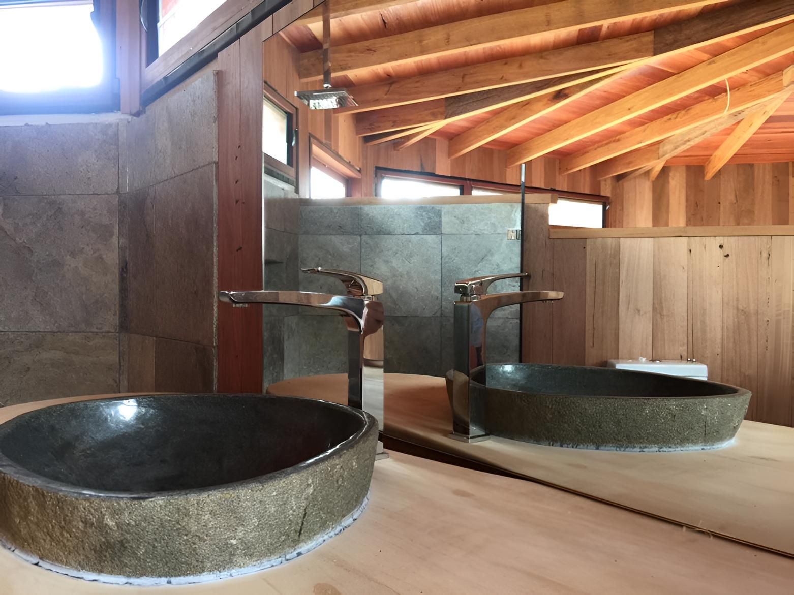 A Bathroom With Two Sinks And A Mirror — Pavy's Glass In Port Macquarie, NSW