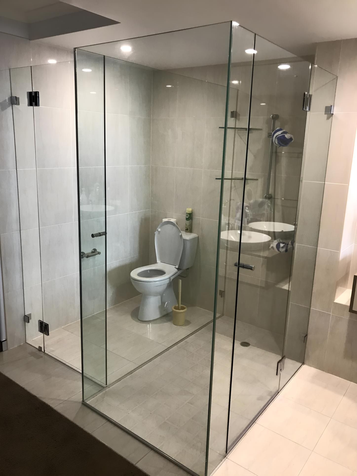 A Bathroom With A Toilet , Sink And Shower Stall — Pavy's Glass In Port Macquarie, NSW