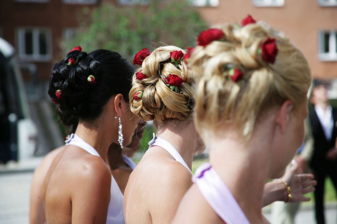 roses tucked in the hair