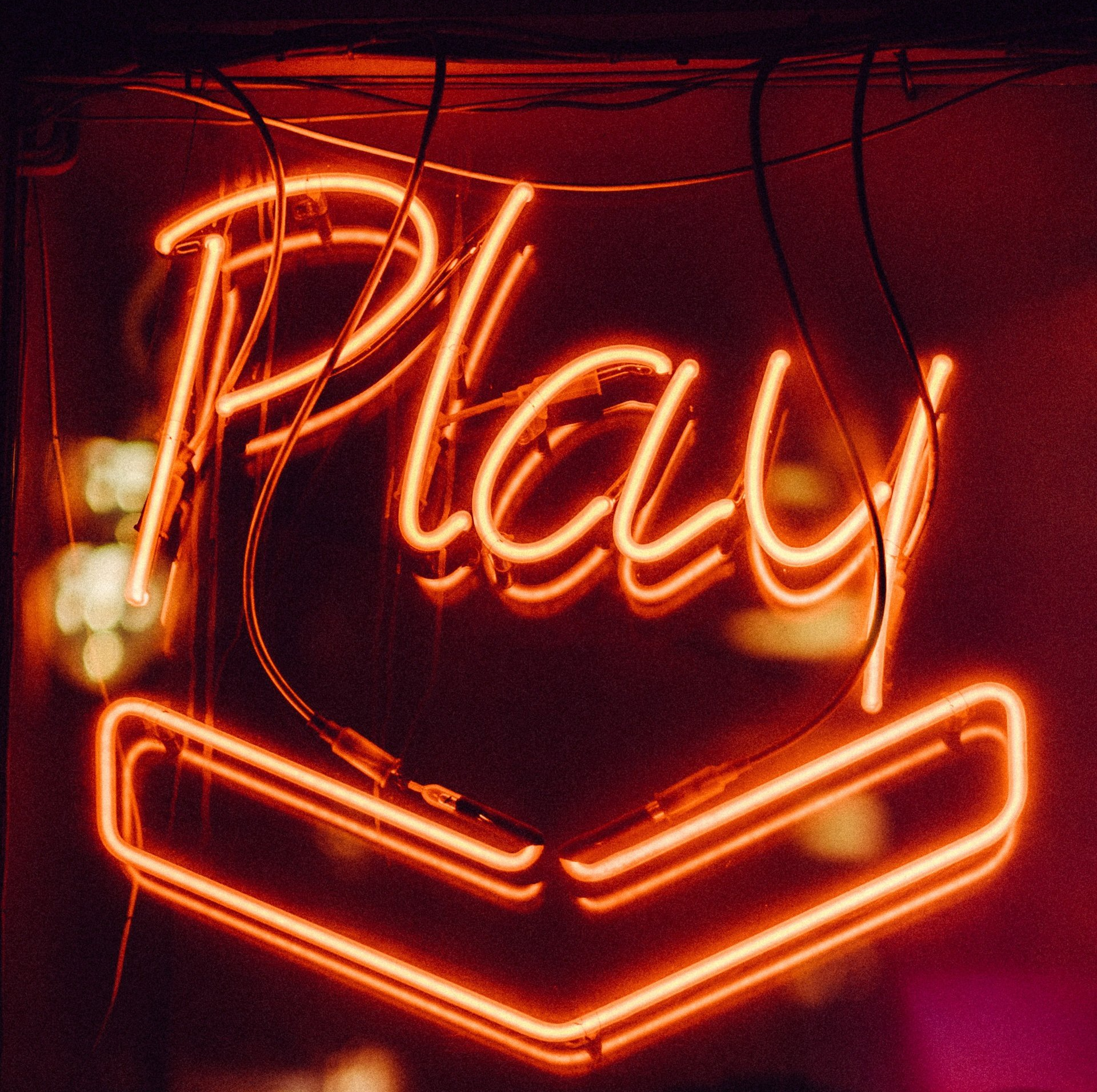 neon sign, 'Play'