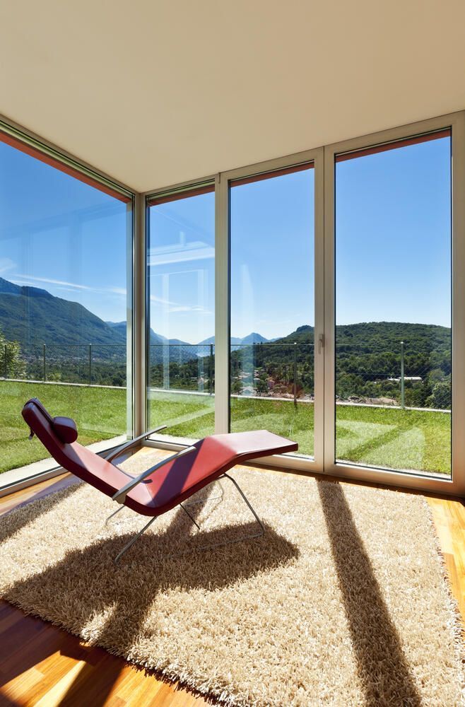 Chair is Sitting in a Room With a Lot of Windows — Abstract Window Cleaning in Hopkins Creek, NSW