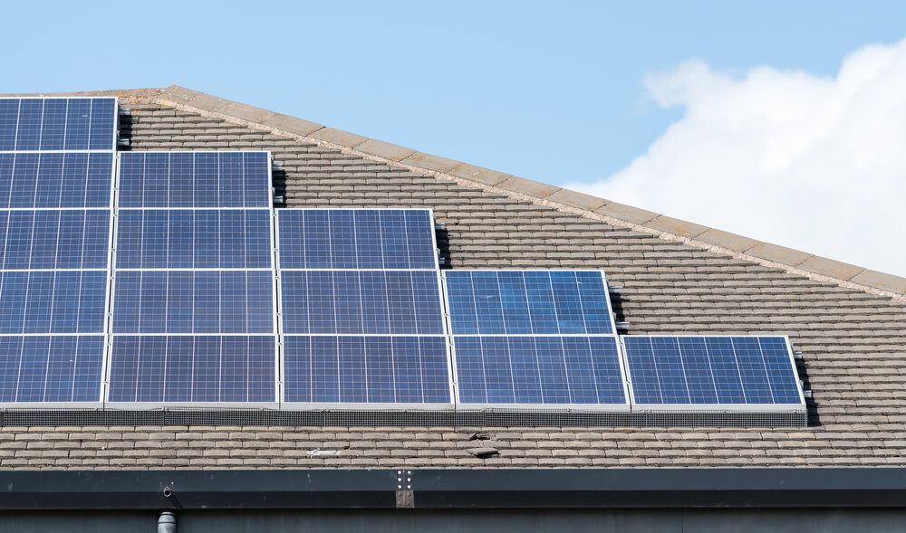 Row of Solar Panels on the Roof of a House — Abstract Window Cleaning in Tweed Heads, NSW
