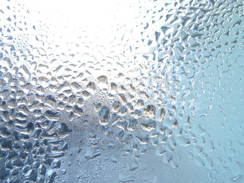 Close Up of Water Drops on a Glass Surface — Abstract Window Cleaning in Hopkins Creek, NSW
