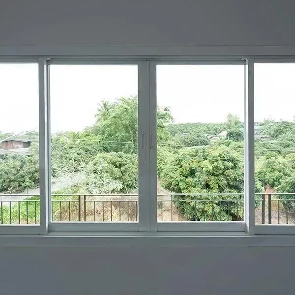 Large Window With a View of Trees and a Balcony — Abstract Window Cleaning in Hopkins Creek, NSW