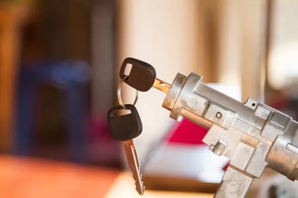 Car Keys Inserted in a Car Ignition Lock — Shaine Hunter Locksmiths in Camooweal, QLD