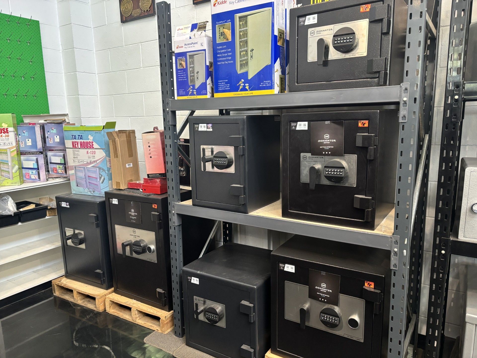 Shelves of Black Safes in a Store — Shaine Hunter Locksmiths in Winton, QLD