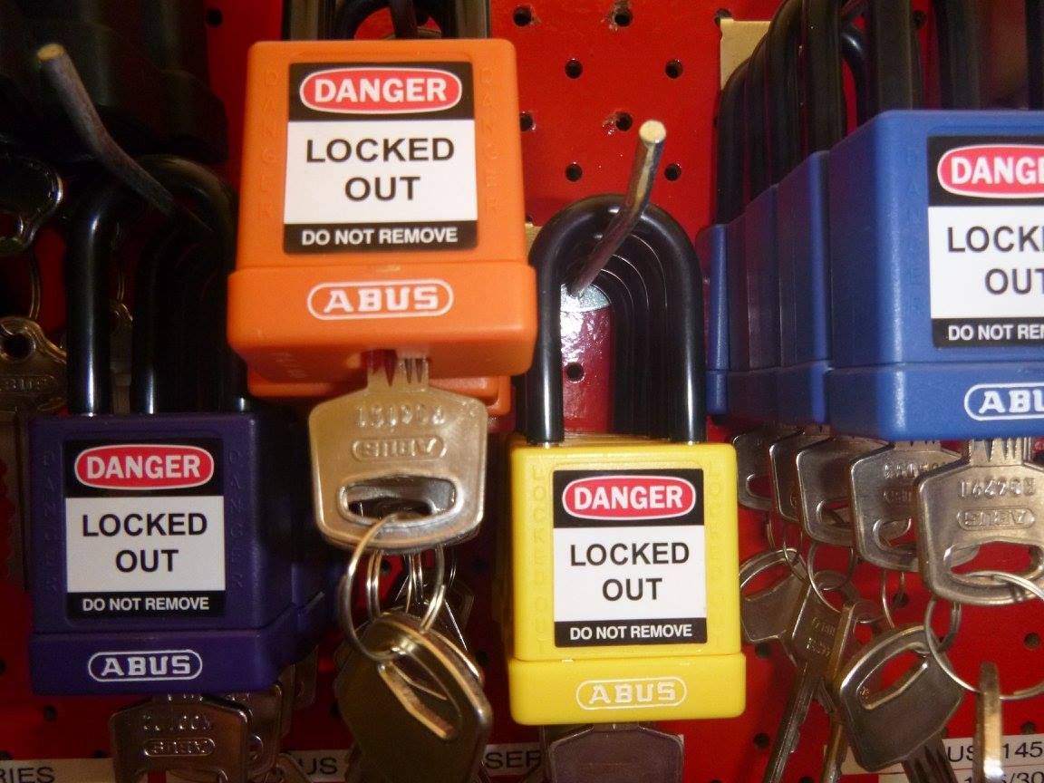 Safety Locks Hanging on a Pegboard — Shaine Hunter Locksmiths in Richmond, QLD