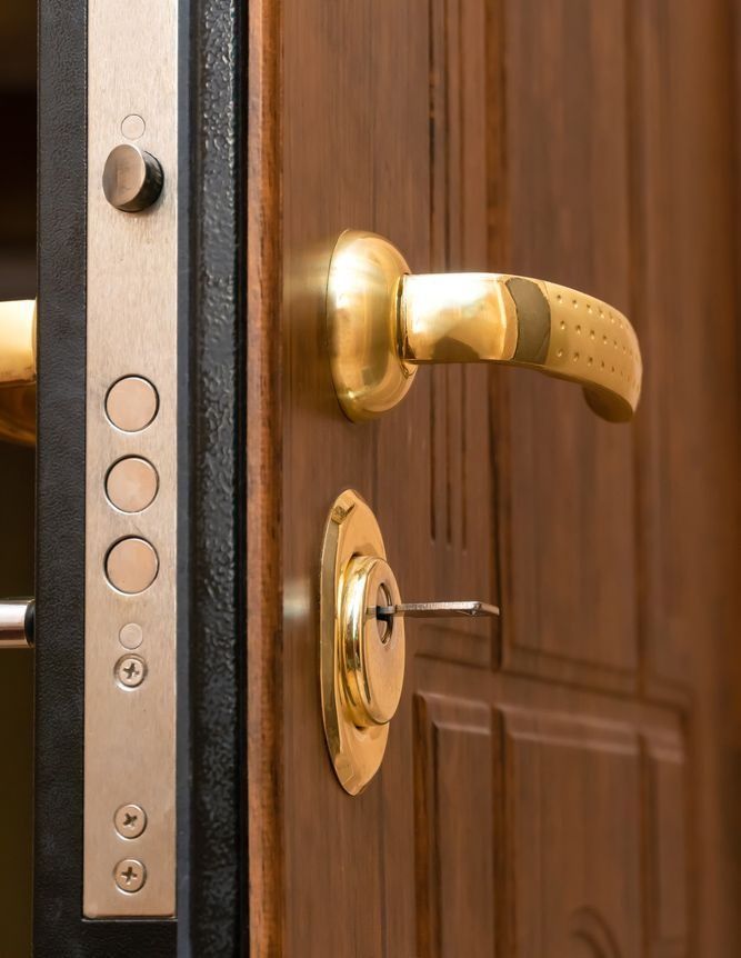Close-up of a Brown Wooden Door — Shaine Hunter Locksmiths in Mount Isa City, QLD
